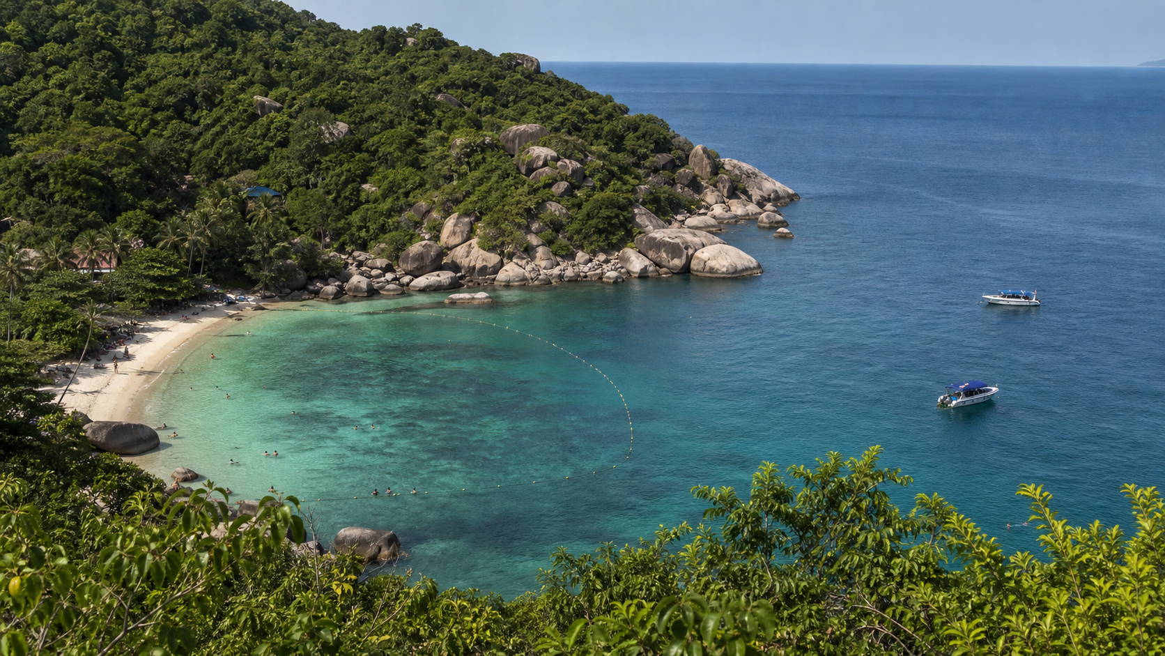 AI-generated elevated view of a tropical granite bay with swimmers and boats separated offshore